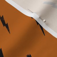 grungy lightening bolt - burnt orange