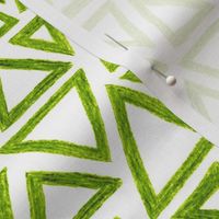 crayon triangles in leaf green on white