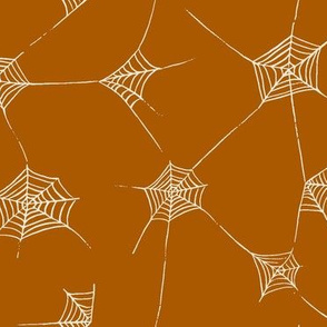Halloween Fabric Spiderwebs on Dark Burnt Orange