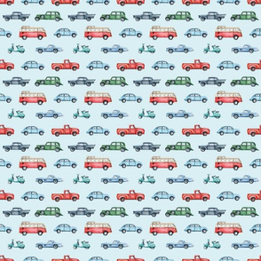 Small Scale Old Vintage Cars on Light Blue