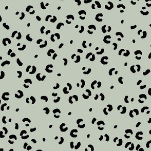 Messy single leopard spots minimalist boho animal print texture for wild baby nursery textiles mist green black 