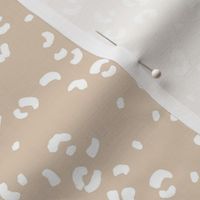 Messy single leopard spots minimalist boho animal print texture for wild baby nursery textiles beige sand white 