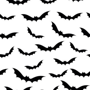 Black and white flying bats