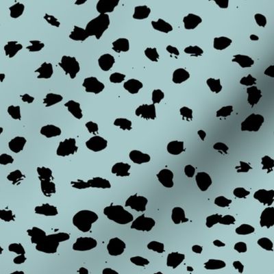 Wild organic speckles and spots animal print boho black marks on soft blue