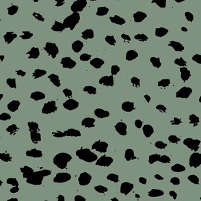 Wild organic speckles and spots animal print boho black marks on sage green
