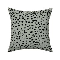 Wild organic speckles and spots animal print boho black marks on eucalyptus