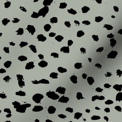 Wild organic speckles and spots animal print boho black marks on eucalyptus