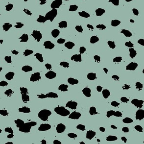Wild organic speckles and spots animal print boho black marks on ocean green