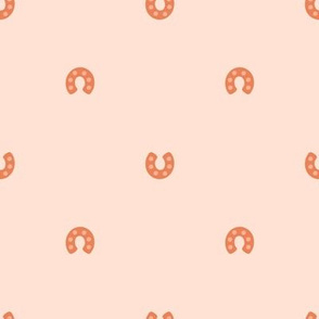 Horseshoes in Peach Cream