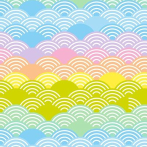 Seigaiha or seigainami literally means blue wave of the sea. rainbow seamless pattern abstract scales simple Nature background japanese circle purple pink yellow blue green pastel colors. Vector illustration