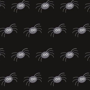 Cute grey spiders on black
