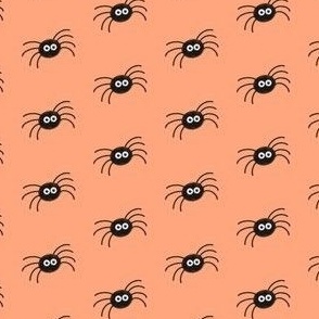 Cute spiders on orange