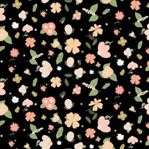 Pink and peach flowers on a black background