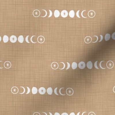 White moon phases. Sand background