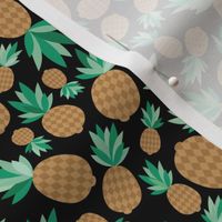 Tropical pineapple garden sweet summer fruit design in caramel brown green on black