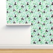 Large Scale Pandas and Tropical Leaves on Pale Mint Green