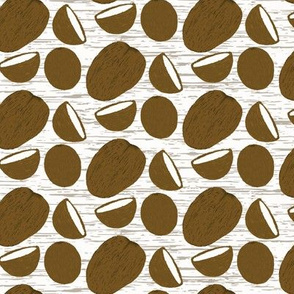 Coconuts whole half and husked texture background