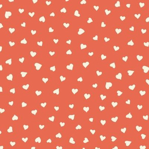 Little Hearts in beige on red