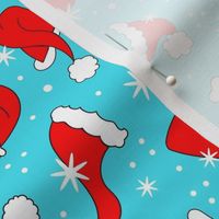 Medium Scale Red Santa Hats and Snowflakes on Blue