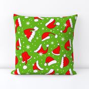 Large Scale Red Santa Hats and Snowflakes on Green