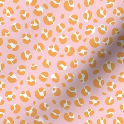 The bold leopard design animal print panther spots orange honey on pink