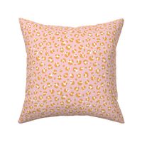 The bold leopard design animal print panther spots orange honey on pink