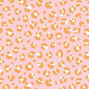 The bold leopard design animal print panther spots orange honey on pink
