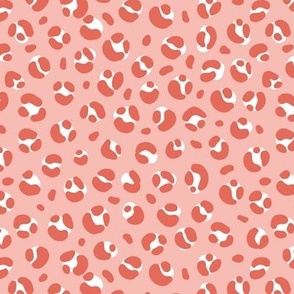 The bold leopard design animal print panther spots coral pink on blush