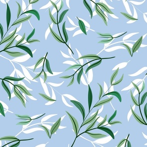 tea tree leaves on soft cornflower blue