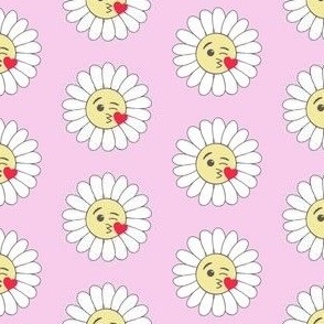 Emojidaisies blowing kisses on pink