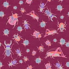 Tossed scattered Bugs, mini beasts, beetles and grasshoppers, on dusky pink burlap texture