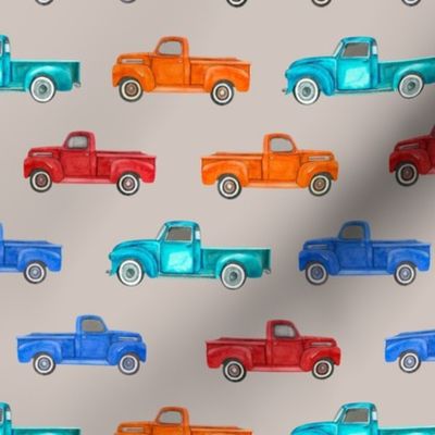 Medium Scale Colorful Vintage Trucks  on Tan