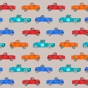 Small Scale Colorful Vintage Trucks  on Tan