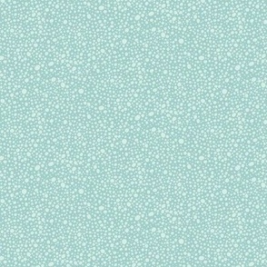 Random white dots on aqua blue