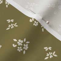 Dainty Cream Flower Springs on Olive