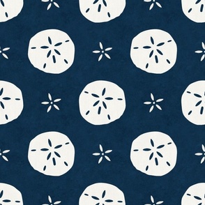 Large Scale Sand Dollars on Navy Blue Ocean Water Background 