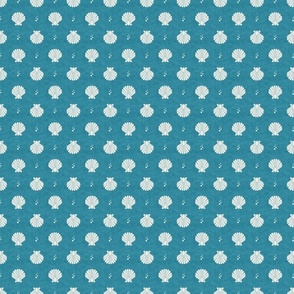 Small Scale Scallop Shells on Turquoise Blue Ocean Water Background