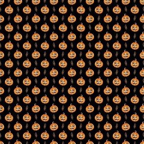 Small Scale Halloween Jackolantern Pumpkins on Black