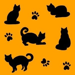 black cats and paw prints orange halloween