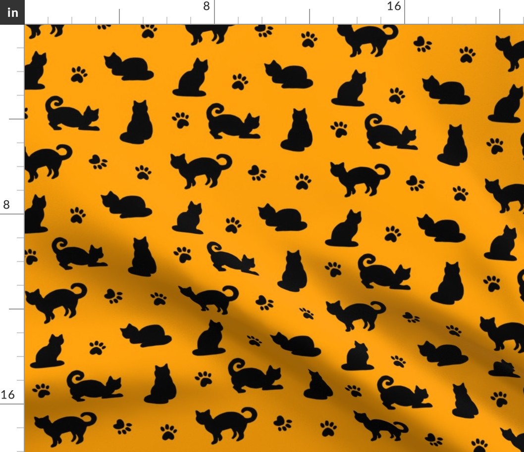 black cats and paw prints orange halloween