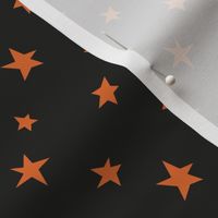 Small scale // Orange pointed stars over black solid // coordinate