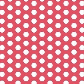White polka dots on pink background
