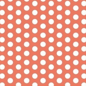 White polka dots on orange background