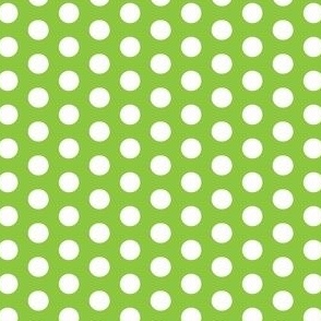 White polka dots on a lime green background 