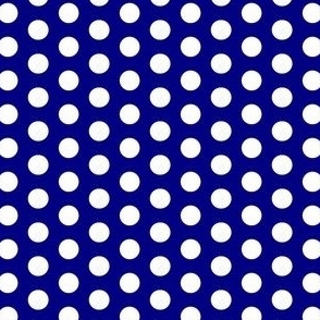 White polka dots on a blue background 
