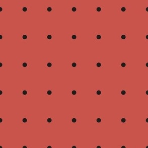 Black dots on red