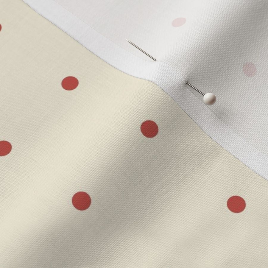 Red dots on cream white