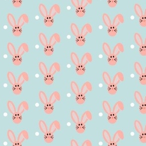 Pink rabbit in pattern on blue background