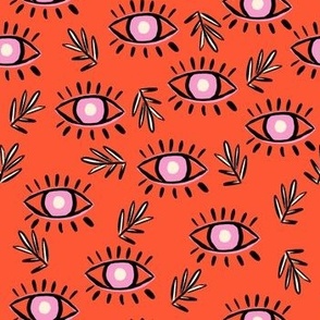 mystical eyes on bright orange