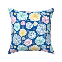 Warm day flowers on blue repeat pattern